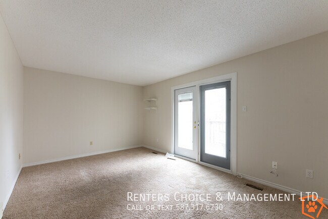Photo - Townhouse featuring Extra Storage, Assigned Parking & Condo Amenities