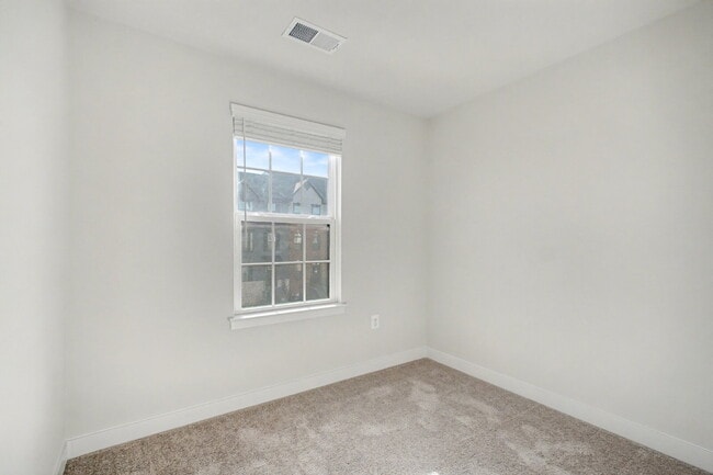 Photo - **Special Move-in Offer**  $500 off of the first month's rent.

Exceptional 3-Level Corner Unit T...