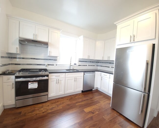 Photo - Renovated 3 Bed / 2 Bath in Allston | In-Unit Laundry | 9/1