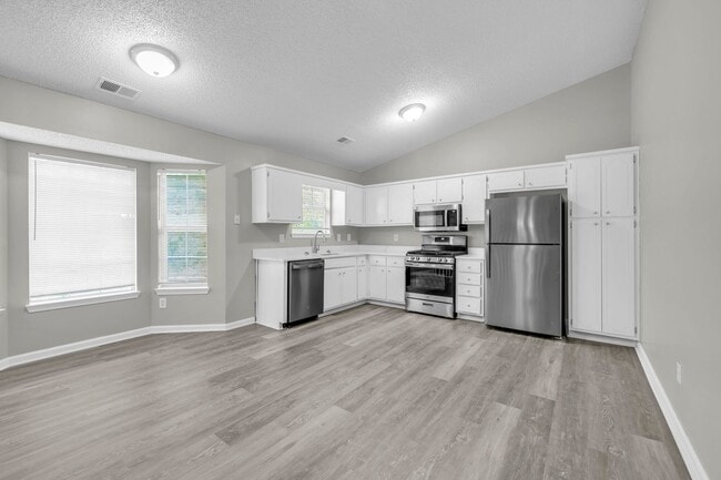 Photo - Welcome to your beautifully refreshed home in Hampton, where comfort, style, and convenience come...