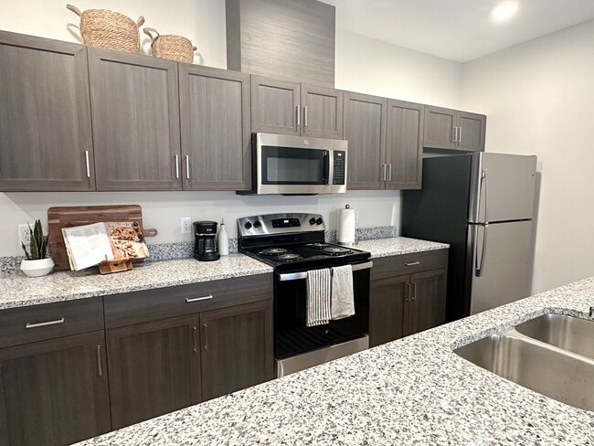 Cocina modelo - Mona Shores Flats