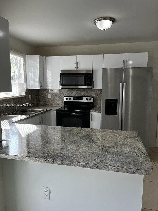 Photo - 1740 NW 64th St Unit 2