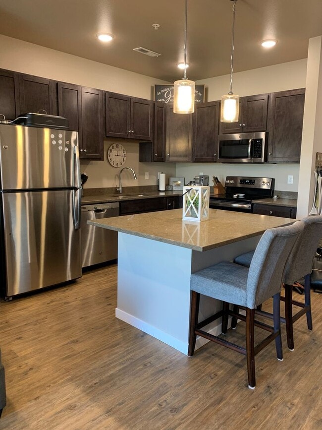 Photo - Spacious 1-Bedroom/1.5-Bath, unit 305, available Early July 2026! Unidad 80-305