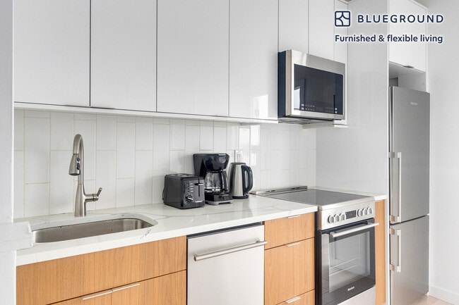 Photo - 501 1/2 E 83rd St Unidad FL3-ID1998