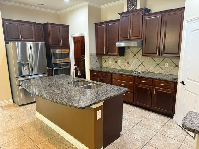 Photo - 3 bedroom + office or 4th bedroom, storm shelter, neighborhood pond and walking track!