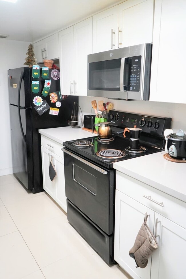 Kitchen with pantry - 269 NW 7th St Unit 417