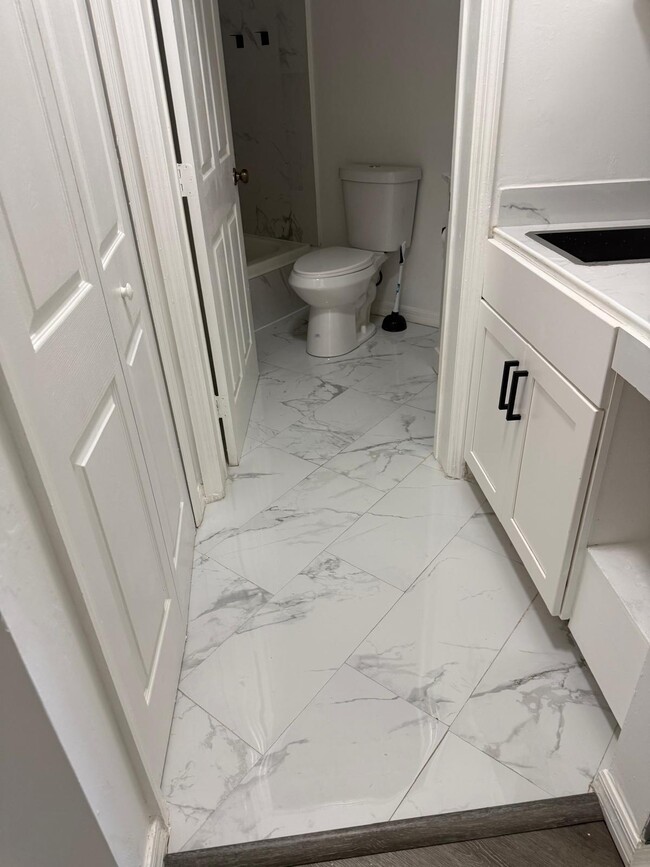 Photo - 9877 Perfect Dr Unit #129 Side B