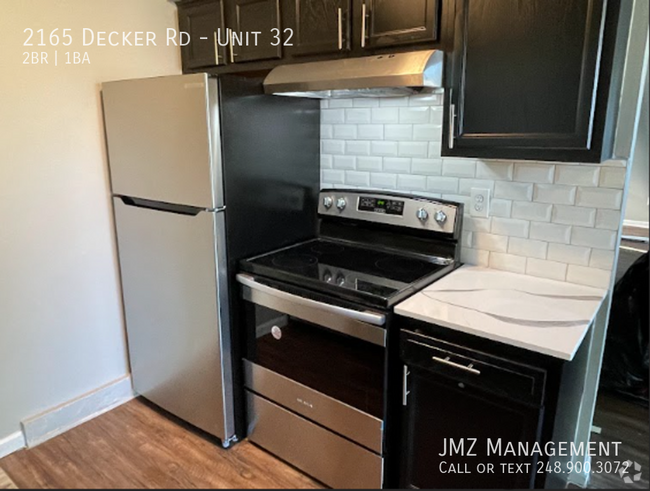 Building Photo - Beautifully Updated Apartment in Walled Lake! Unit 32