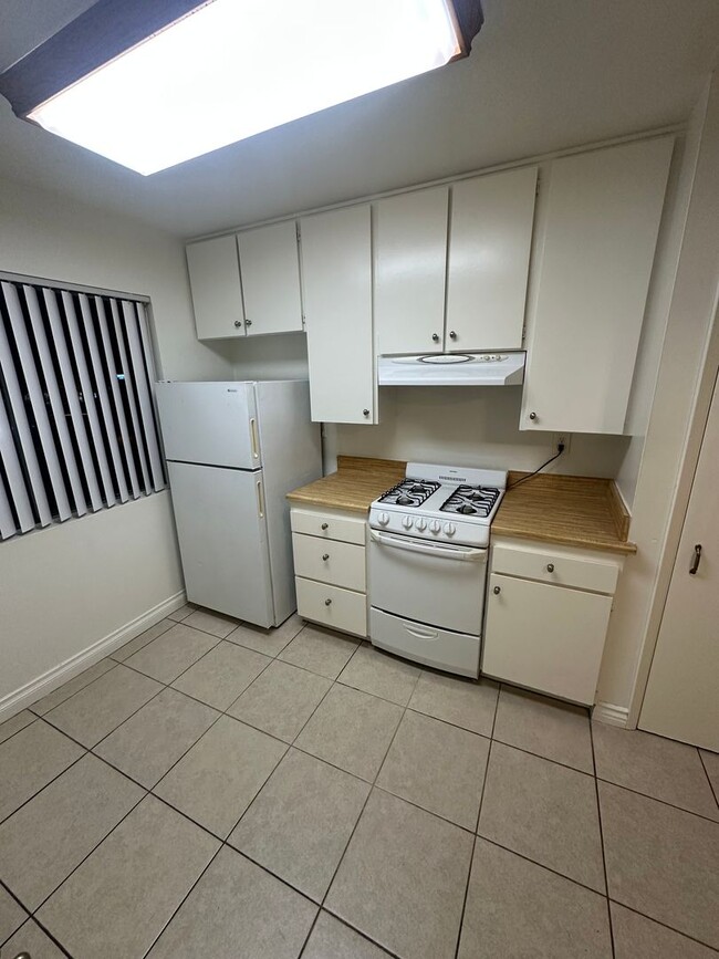 Photo - Upstairs 2BD/1BA Condo with 1 reserved cov...