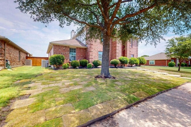 Photo - Spacious 4-Bedroom Home with Bonus Room and Large Backyard in Caruth Lake