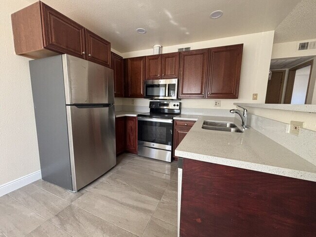 Photo - Downstairs 2BR/1BA—recently updated with n... Unit B