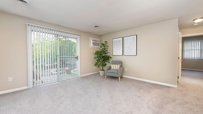 Enjoy a vibrant living space in our spacious open floor plans with cozy carpeting underfoot - designed for comfort and versatility. - Welby Park Estates