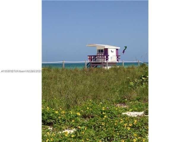 Building Photo - 8132 Harding Ave Unit 15