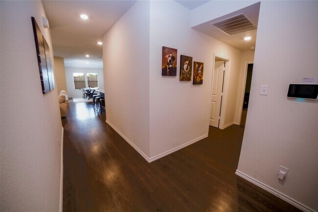 Photo - Boasts 4 bedrooms with 2 baths on a premier lot. As you enter the home, you will be greeted with ...