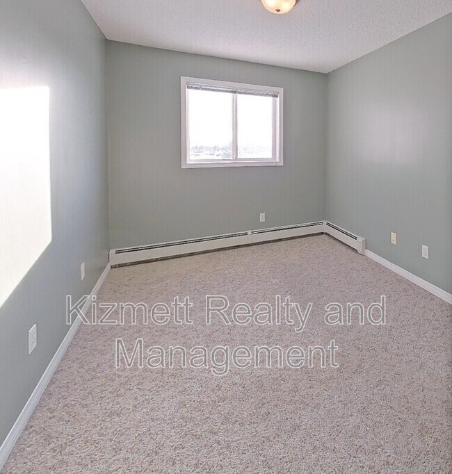 Photo - 9932-9100 100 Ave Unit 402