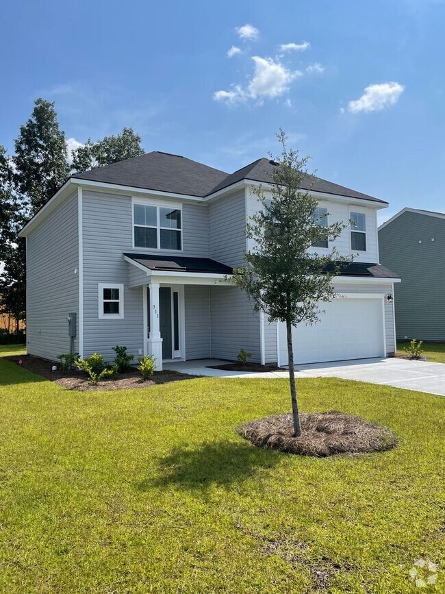 Building Photo - THE COMMONS AT RICHMOND HILL **Rent Specia... Rental
