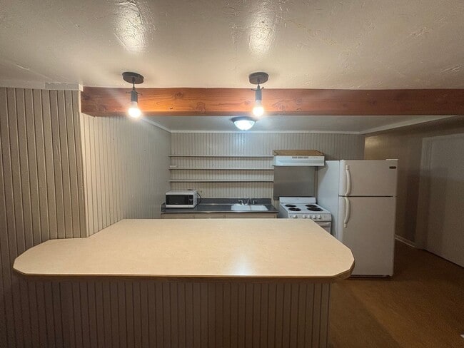 Photo - Spacious 2BR Basement Apartment – Utilitie...