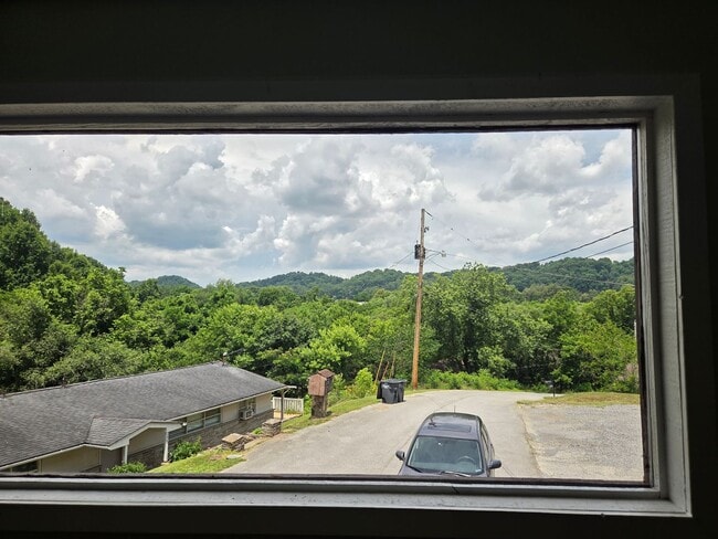 Photo - 2 Bedroom / 1 Bath bonus room, large living kitchen/dining room combo duplex Unit #5