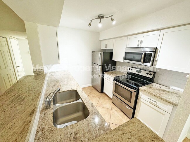 Photo - 2405 NW 33rd St Unidad 1213 Rental