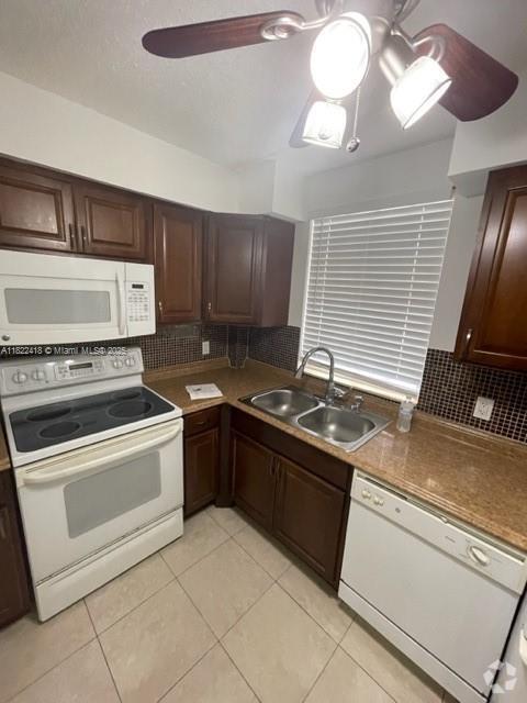 Building Photo - 6135 NW 186th St Unit 205 Rental