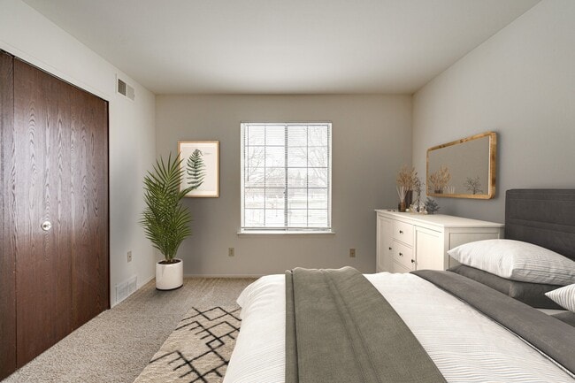 Dormitorio modelo con diseño Magnolia - Fox Pointe Apartments