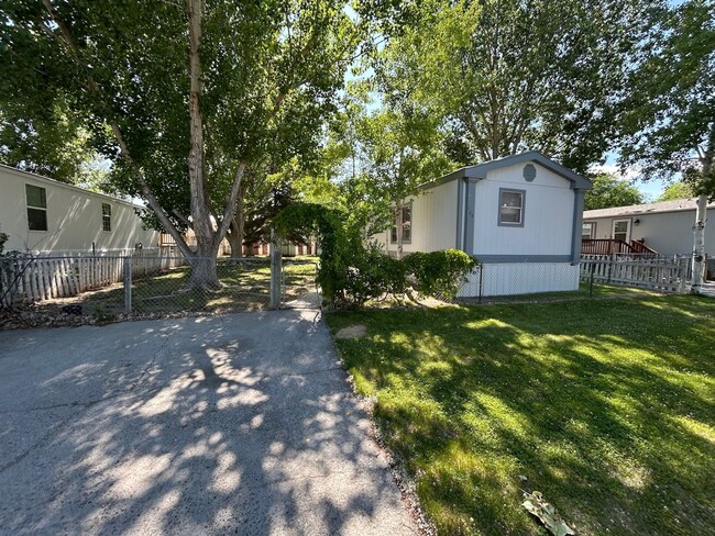 Photo - 3 Bed 2 Bath Mobile Home with Fenced Yard and Storage Shed