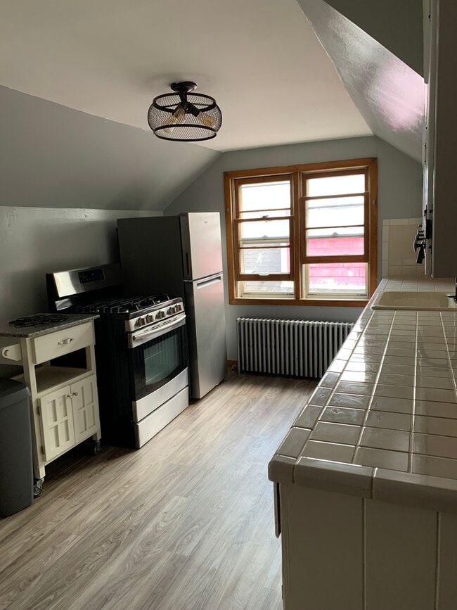 Photo - 1997 Hertel Ave Unit 1 bd upper