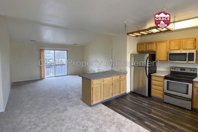 Building Photo - 8495 S Reed St Unit 3-302