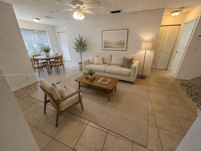 Building Photo - 3370 Pinewalk Dr N Unit 1213
