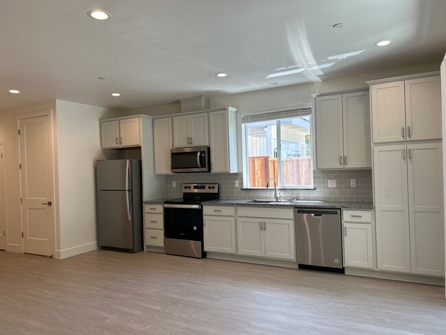 Photo - Coming soon! 2 bed 1 bath townhome with attached garage