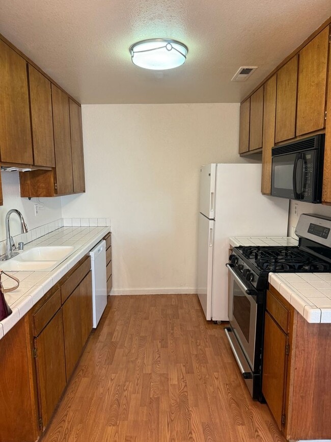 Photo - **Available Now** 2 Bedroom 1 Bath, 1st Floor End Unit Condo