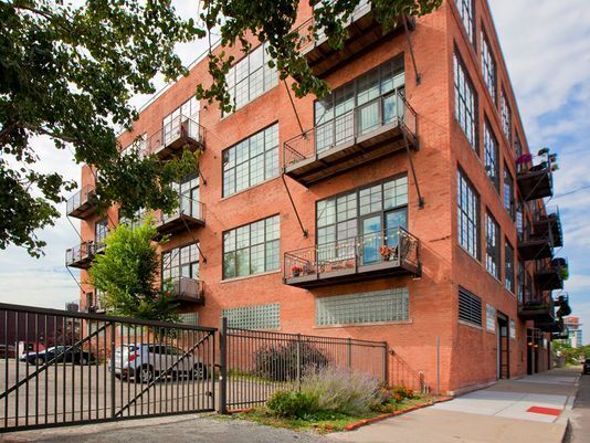 Building Exterior + Gated Parking - 2003 Brooklyn St Unit 210