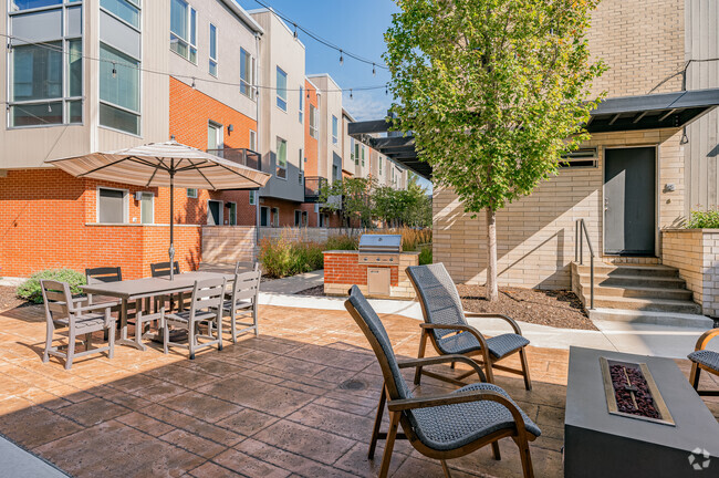 Resident Patio With Firepit & Grill - Hazel 8 Apartments