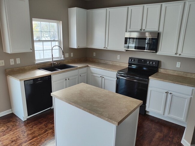 Photo - Beautifully maintained 4-bedroom, 2.5-bath over 2,200 sqft with a 2 car garage!