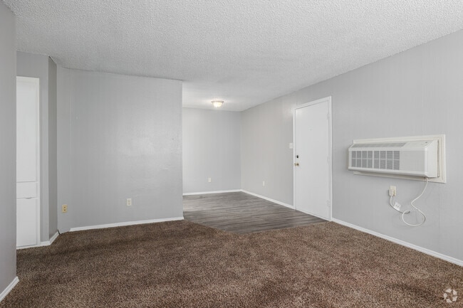 B1 - 2HAB, 1BA - 825SF - Sala de estar - Crossland Square