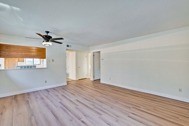 Building Photo - New Vinyl Plank Flooring, Fresh Interior Paint, 1 Car Garage + 1 Assigned Outdoor Parking Space -...