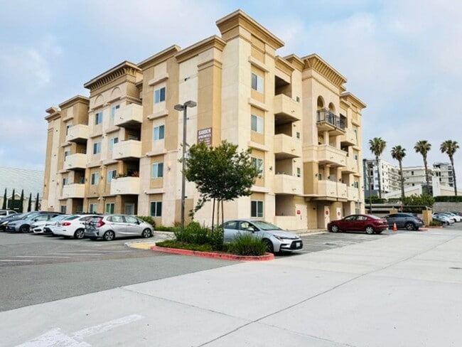 Building Photo - Modern 1 Bedroom Apartment with Private Balcony, Elevator Access & Assigned Parking in National City Unit A303