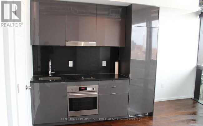 Photo - 21 Lawren Harris Square Unit 910