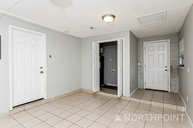 Photo - 3 BR/2BA | Newly Renovated Single Family Home | 1-Car Covered Parking | Front yard!
