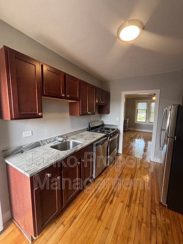Building Photo - 2907 W 56th St Unit 2