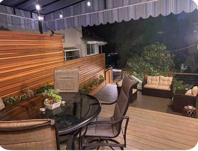 Multi-level patio off of living room double French doors