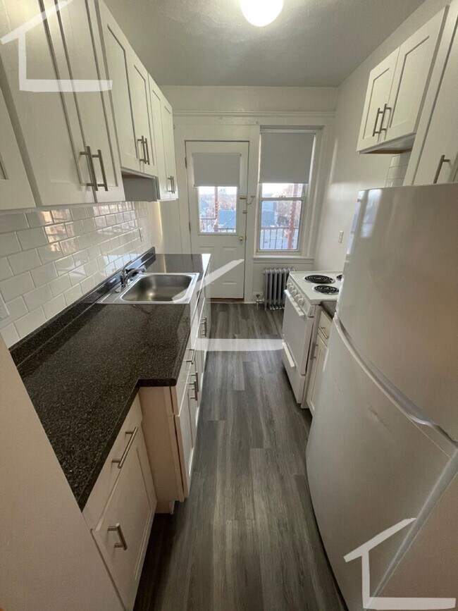 Photo - 9/1- No Fee! Large studio/small 1BR on Green Line in Brighton