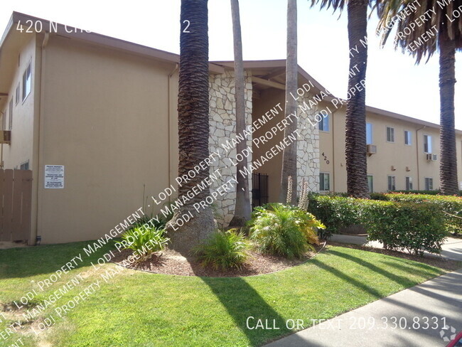 Building Photo - Upstairs 2 Bedroom Apartment Unit 202