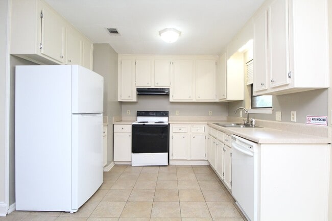 Photo - 4BR Ranch-Style Home off Olive Rd – Fenced Yard & Garage – Available 2/2