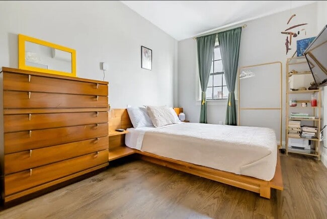 King Sized Main Bedroom with En Suite Bathroom with Solid Wood Mid Century Modern Furnishings - 504 Maple St Unit 4