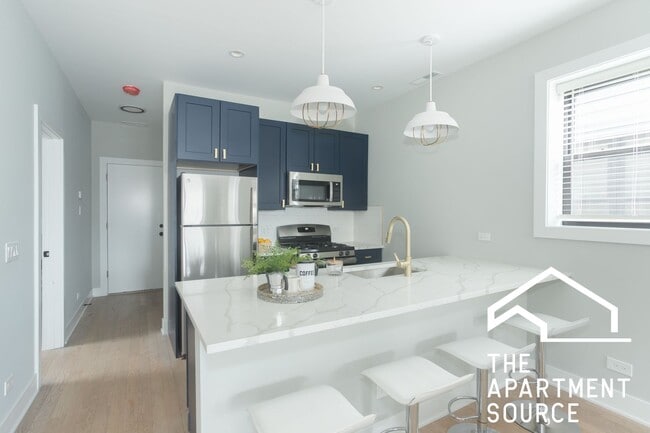 Building Photo - 4409 N Seeley Ave Unit 3B