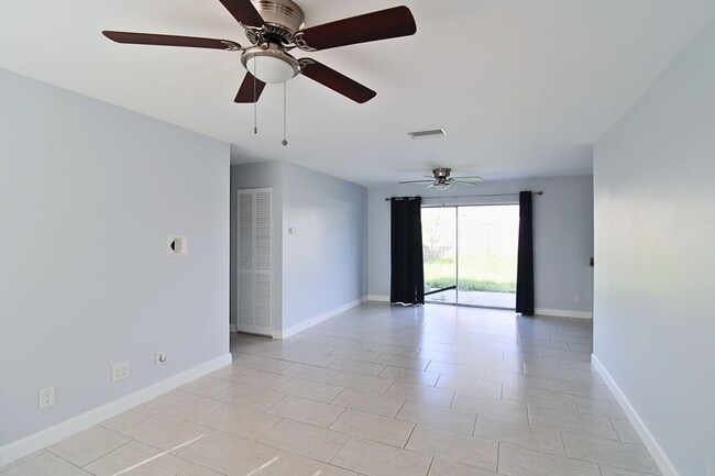 Photo - 3-Bed, 2-Bath Home with Spacious Fenced Ya...