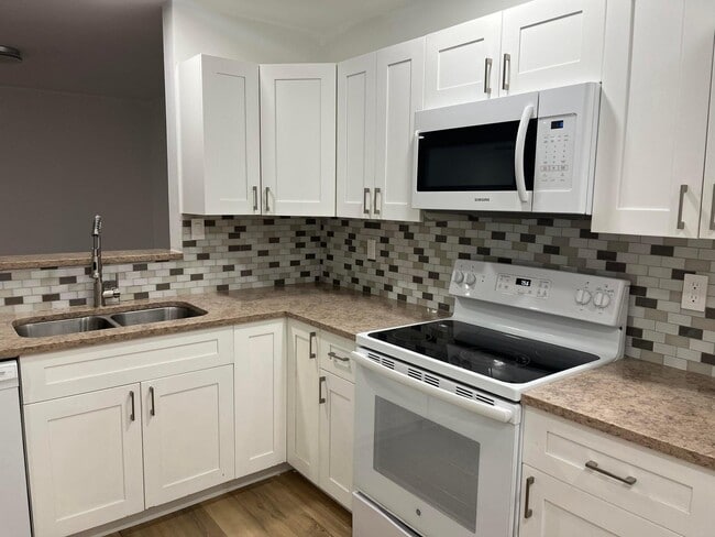 Building Photo - 11241 W Atlantic Blvd Unit 201