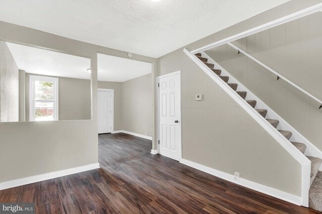 Photo - 3 Bedroom Home with High Ceilings & Natural Light!