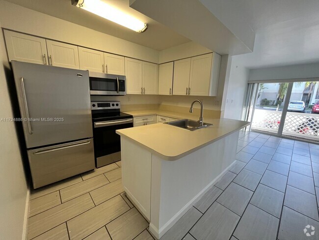 Building Photo - 6755 NW 175th Ln Unit A-9 Rental